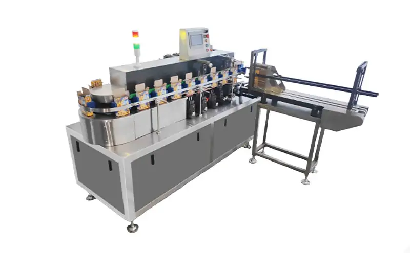 Full view of automatic cartoning machine, continuous carton packing production equipment for food and commodity packaging factory